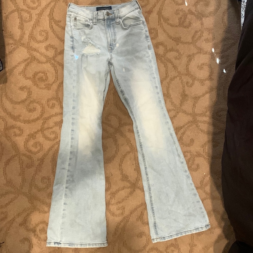 Light blue high rise boot cut jeans